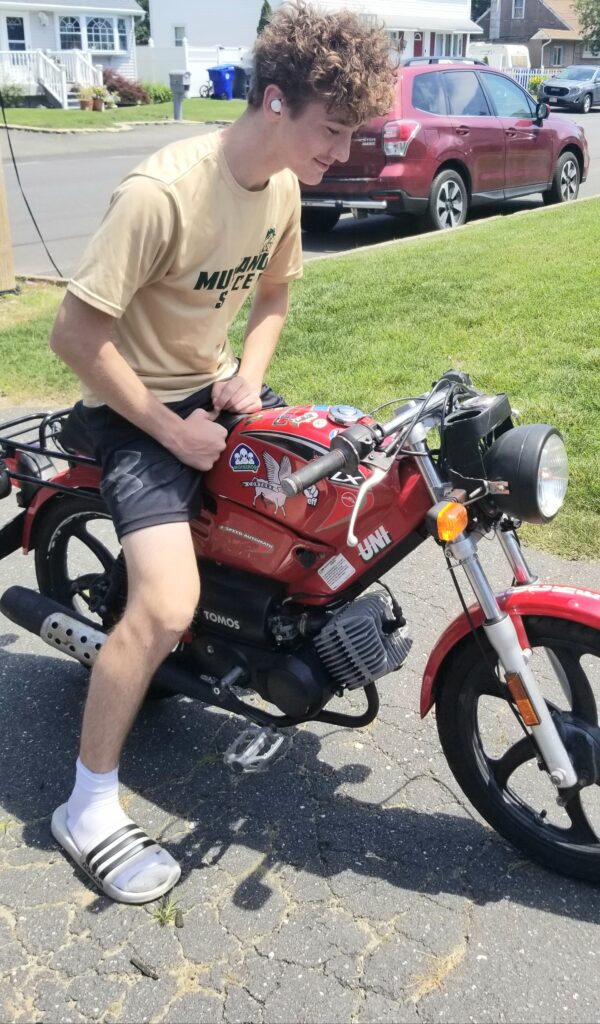 boy on moped